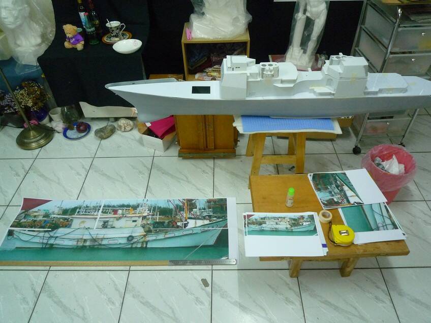 地上的漁船圖到船尖全長是130公分，我的漁船就是照這圖1比1做的